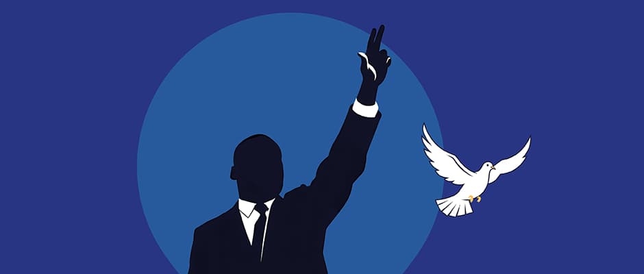 Martin Luther King mit seiner typischen Handgeste und einer Friedenstaube.