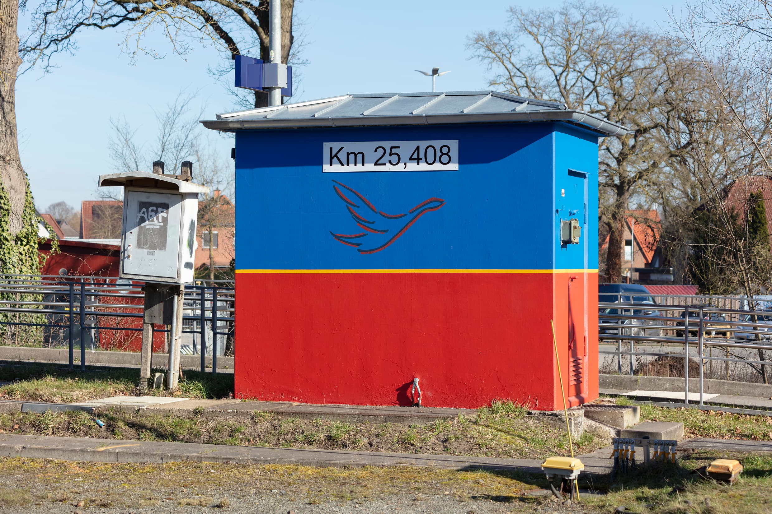 Die Farben blau und rot und ein Teil des Stadtwappens Ganderkesees.